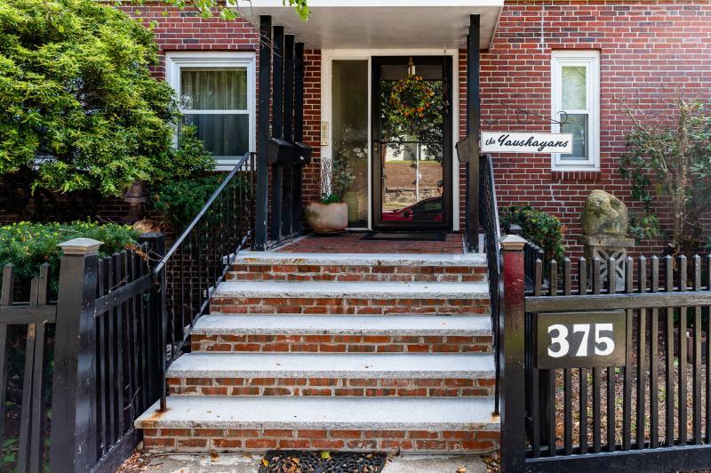 stairs leading up to a glass door